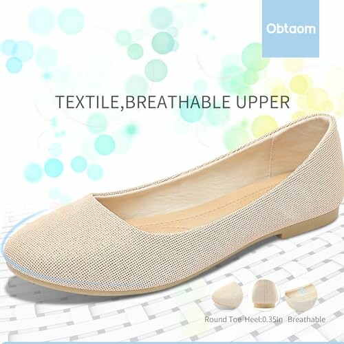 Beige ballet flat shoe with breathable textile upper.