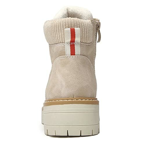 Back view of a beige winter boot with a red stripe and zipper.