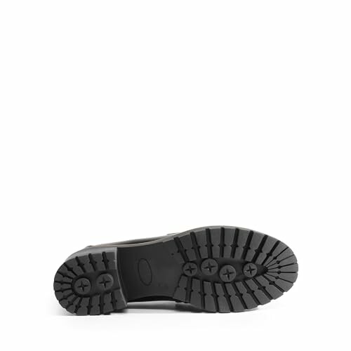 Black boot sole with tread pattern