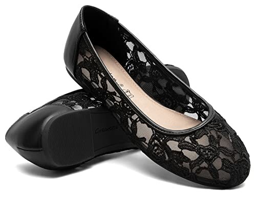 Pair of black lace ballet flats with rounded toes