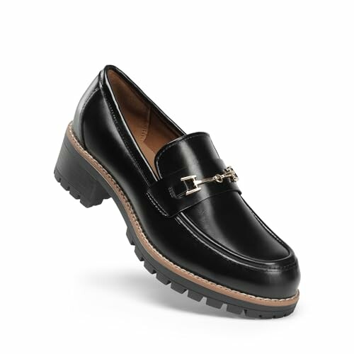 Black leather loafer shoe with chunky sole and gold chain detail