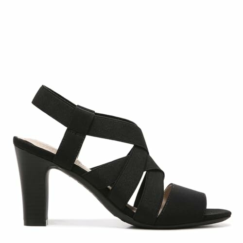 Black strappy heeled sandal with open toe.