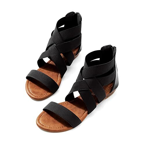 Black strappy sandals with open toe and ankle strap