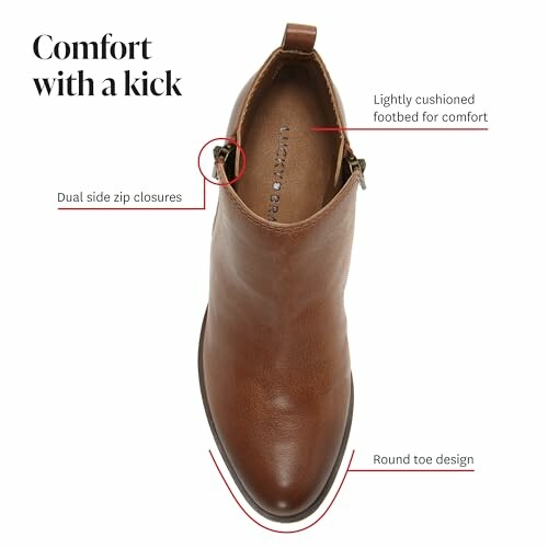 Top view of a brown boot with dual side zip closures and round toe design.