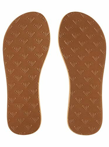 Brown shoe soles with embossed pattern.