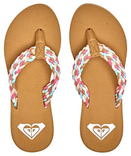 Pair of brown flip flops with colorful braided straps.