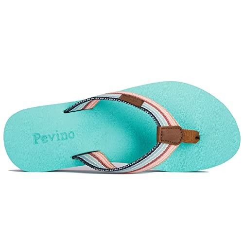 Colorful flip-flop sandal with striped straps on a turquoise sole.