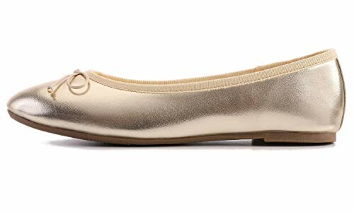 Gold ballet flat shoe with bow detail