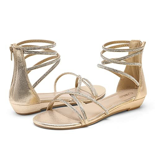 Gold strappy sandals with low heels and zip closure