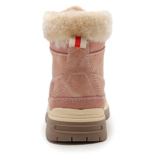 Back view of a pink winter boot with fur lining.