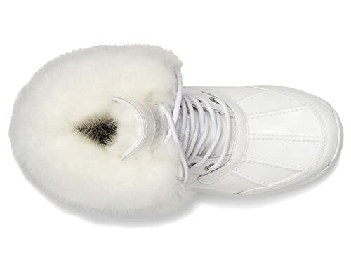 Top view of a white boot with fur lining.