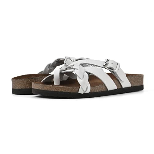 White leather sandals with braided straps and buckles