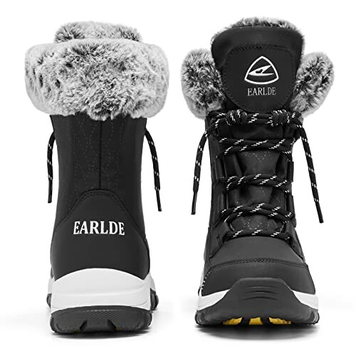 Pair of black winter snow boots with faux fur lining.